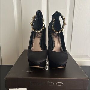 Bebe Black Women's Platform Heels with Gold Accents